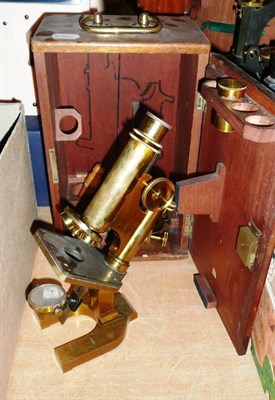 Lot 123 - A Lacquered Brass Monocular Compound Microscope by R & J. Beck Ltd, London, no.21871, with rack and