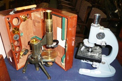 Lot 125 - A Black Enamelled and Lacquered Brass Monocular Compound Microscope by J. Swift & Son, London, with