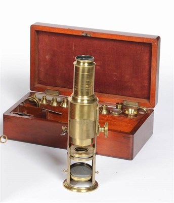 Lot 135 - A 19th Century Lacquered Brass Drum Microscope, with rack & pinion and draw tube focusing,...