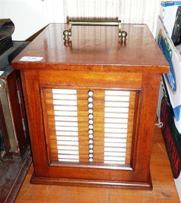 Lot 136 - A Mahogany Twenty One Drawer Microscope Slide Cabinet by R. & J. Beck, London, with hinged and...