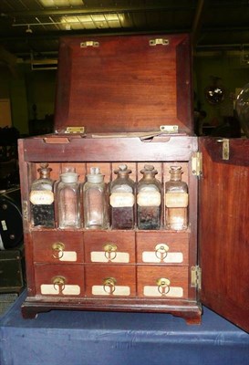 Lot 147 - A 19th Century Mahogany Apothecary's Cabinet by Dalmahoy, London, the hinged lid inset with ivorine