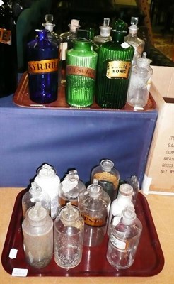 Lot 149 - A Collection of Chemists Bottles and Jars, including a blue glass 'Syrrha' bottle, two ribbed green