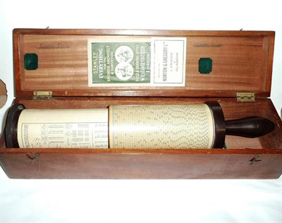 Lot 160 - A Fuller's Calculator by Stanley, London, with brown Bakelite handle, sliding tube and brass...