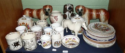 Lot 172 - A shelf including commemorative china, pottery dogs, Rington's caddys, decorative plates etc