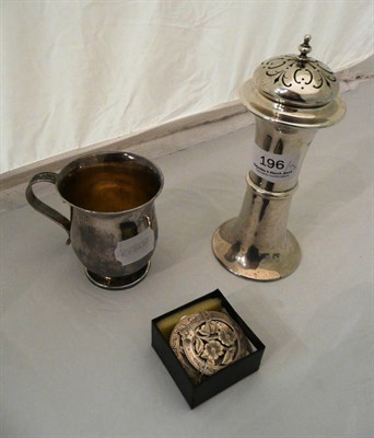 Lot 196 - A silver castor, Chester 1907, a silver christening mug, London 1902 and a white metal buckle...