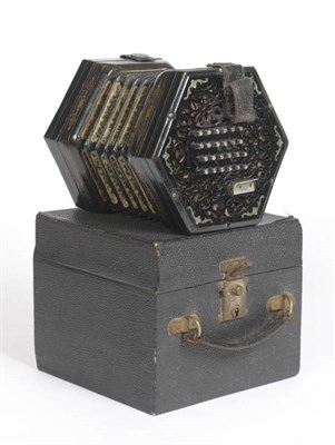 Lot 239 - A Wheatstone Forty Eight Key English System Hexagonal Concertina, the fret carved ebony ends...