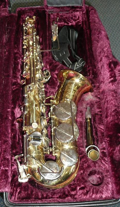 Lot 247 - A Brass Alto Saxophone 'Corton' by Amati, with chrome and mother of pearl keys, in a velvet...