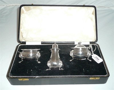 Lot 296 - Cased three piece silver condiment set, Birmingham 1965