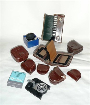 Lot 303 - Rolleiflex Camera Accessories, including lenses and filters and a Schneider Kreuznach lens.