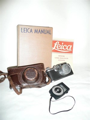 Lot 304 - A Leica IIIa Camera No.220189, circa 1936, in chrome, with Summarit f/2 50mm lens no.526263, filter