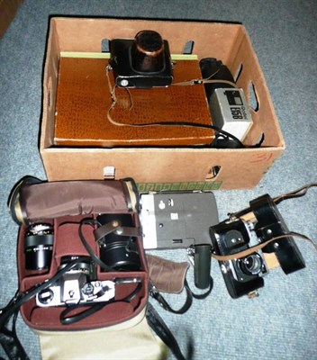 Lot 314 - Four Cameras - Olympus OM10 with three lenses in a nylon zip case, Rollei 35S in leather zip...