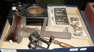 Lot 332 - Three Stereoscopic Viewers - Stereoscope No.1 Mk.1 No.946 hand held viewer, ebonised table top...