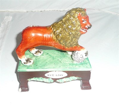 Lot 384 - Pearlware lion figure (a.f.)