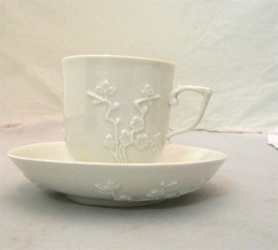 Lot 386 - Meissen Blanc de Chine cup and saucer