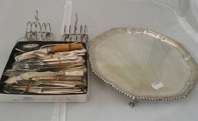 Lot 390 - Quantity plate including salver, two toast racks, flatware, silver cake forks and watch