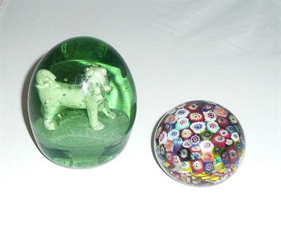 Lot 392 - A millifiori paperweight and a green sulphide dump set with a pug dog