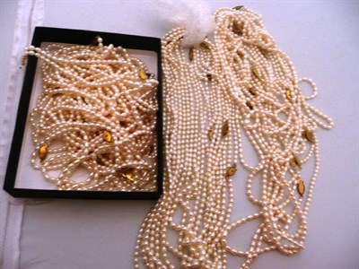 Lot 414 - Twenty-five strands of river pearls