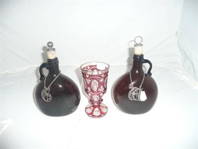 Lot 453 - Two brown glass bottles and an overlay vase