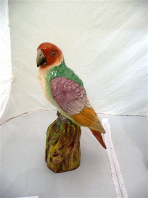 Lot 455 - Staffordshire pottery parrot