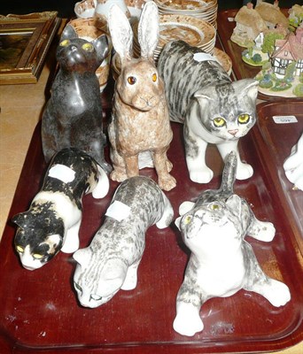 Lot 463 - Five glazed cat ornaments and another