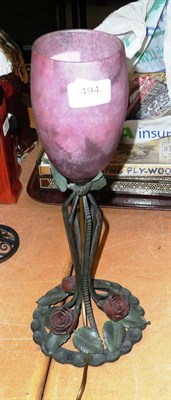 Lot 494 - An Art glass table lamp with pink mottled shade and rose and leaf base