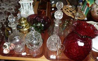 Lot 506 - Two trays of assorted drinking glasses, glass decanters and a cranberry type glass light shade