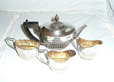 Lot 535 - A Bachelors silver teapot, London 1890, a silver milk jug and a sugar bowl, Chester 1899 and...