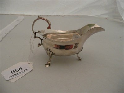 Lot 556 - A George III silver cream jug, London 1765, William Sudell