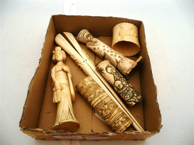 Lot 567 - Box of carved ivory and bone pieces, pre-1947