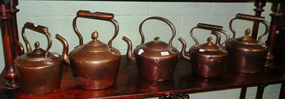 Lot 574 - Five copper kettles