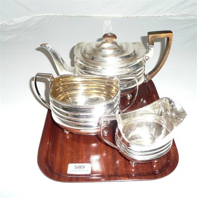 Lot 589 - Silver teapot, sugar bowl and similar jug