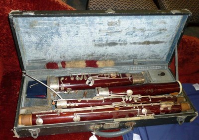 Lot 601 - A cased 'Model 61' bassoon by Lewington, London, with nickel silver mounts.