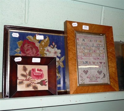 Lot 633 - A framed sampler worked by Mary Mitchell, 1791 and two framed woolworks (3)