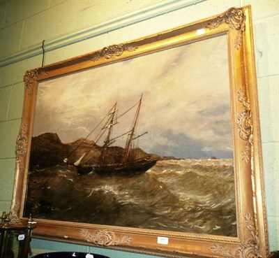 Lot 643 - Oil painting, seascape, a vessel off a coastline in a swell