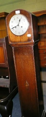 Lot 671 - Oak grandmother clock