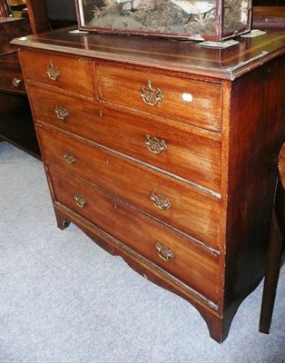 Lot 681 - A late George III mahogany four height chest