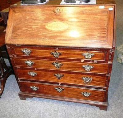 Lot 691 - Inlaid Georgian mahogany bureau