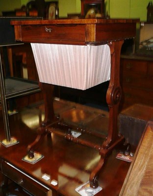 Lot 693 - An early Victorian rosewood work table