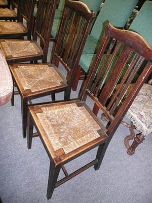 Lot 703 - Set of six oak and rush seated dining chairs