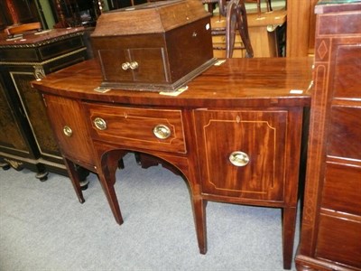 Lot 748 - George III mahogany bow fronted sideboard