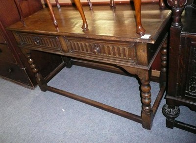 Lot 766 - Oak two drawer table