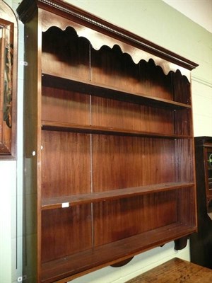 Lot 775 - A mahogany dresser rack