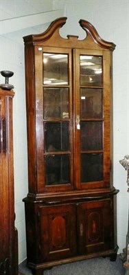 Lot 779 - 18th century and later continental walnut corner cupboard