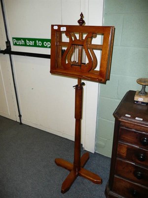 Lot 786 - An oak duet stand