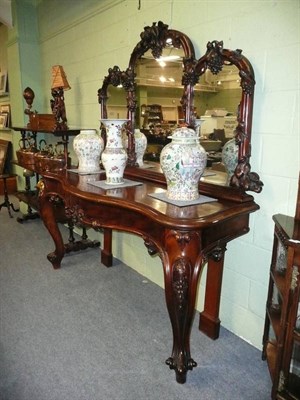 Lot 792 - A Victorian Mahogany Console Table and Mirror, late 19th century, the three arched mirrors...