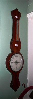 Lot 799 - Barometer and an oil lamp