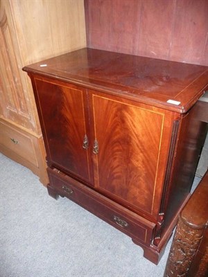 Lot 855 - A mahogany television cabinet