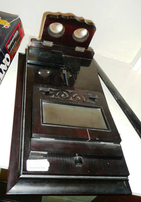 Lot 99 - A 19th century ebonised table top stereo viewer