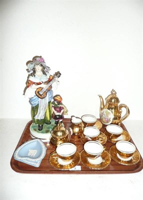 Lot 2 - China figure of a musician, tea wares, Wedgwood, barometer and warming pan