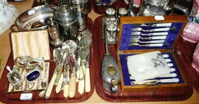 Lot 35 - Two trays of silver plated items including two cocktail shakers, cased mother of pearl handled...